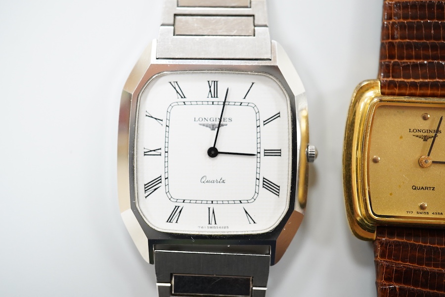 A gentleman's recent stainless steel backed Longines quartz wrist watch, with Roman dial, case diameter 31mm, on a steel bracelet, together with a lady's steel and gold plated Longines quartz wrist watch, case diameter 2